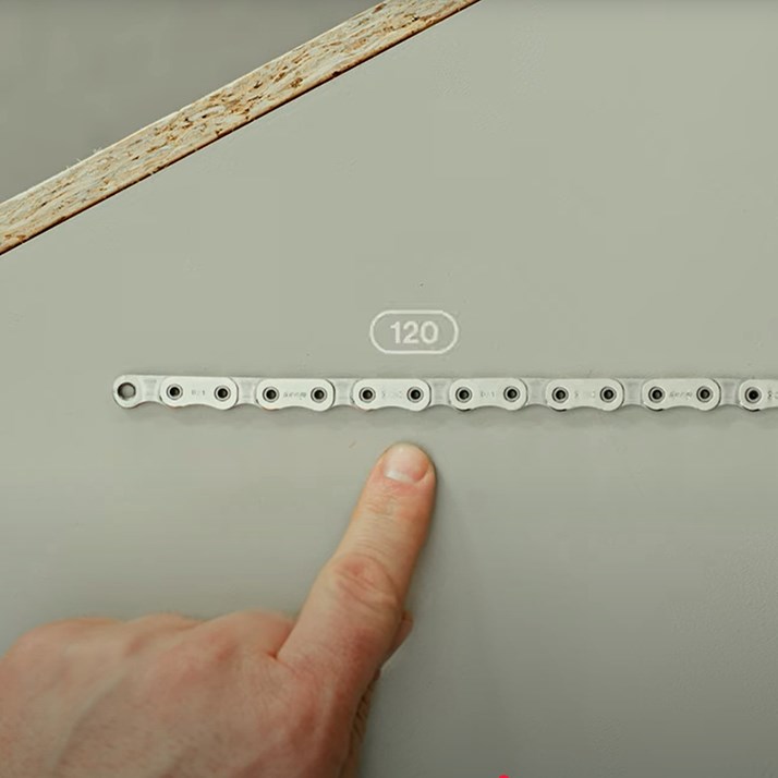 Chain on table with finger counting links