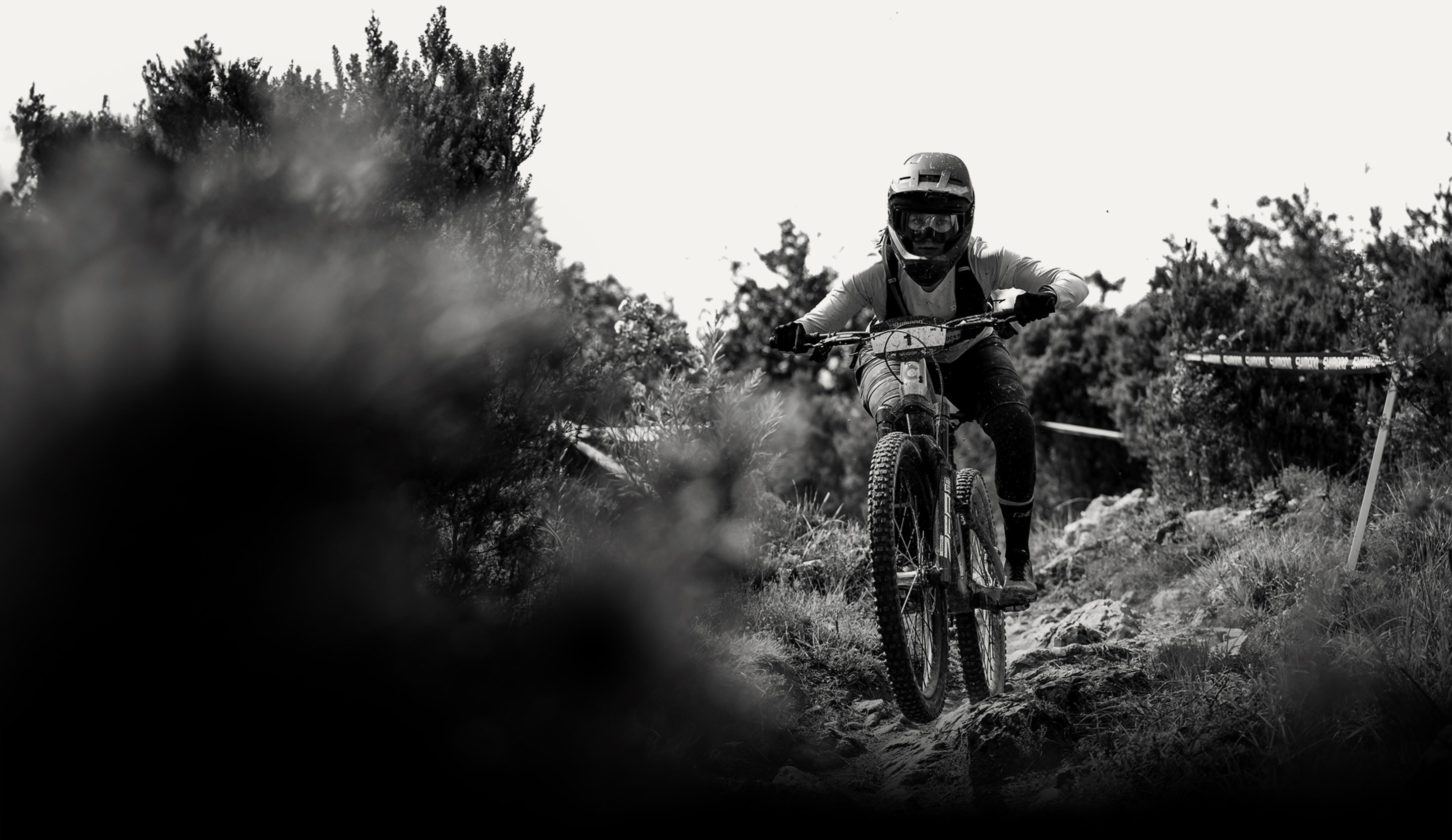 MTB Rider in mid air, black and white image