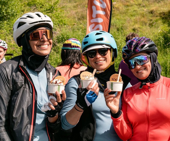 Riders holding iced cream