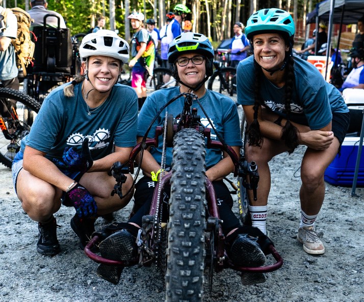 Adaptive cyclists smiling