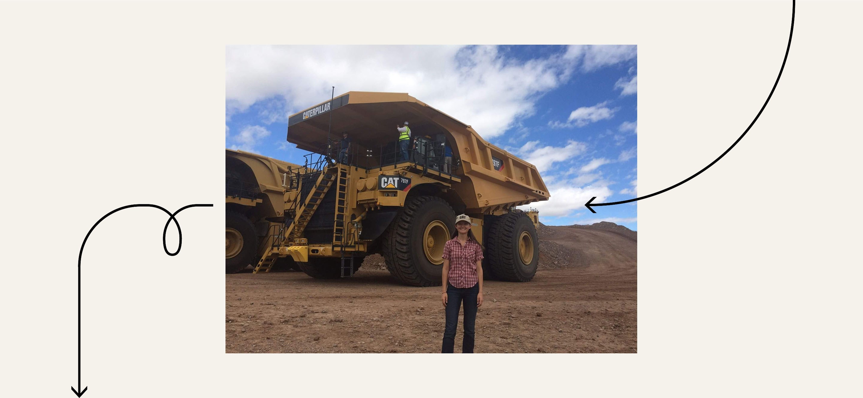 Deanna Mayles infront of a large mining truck she helped build