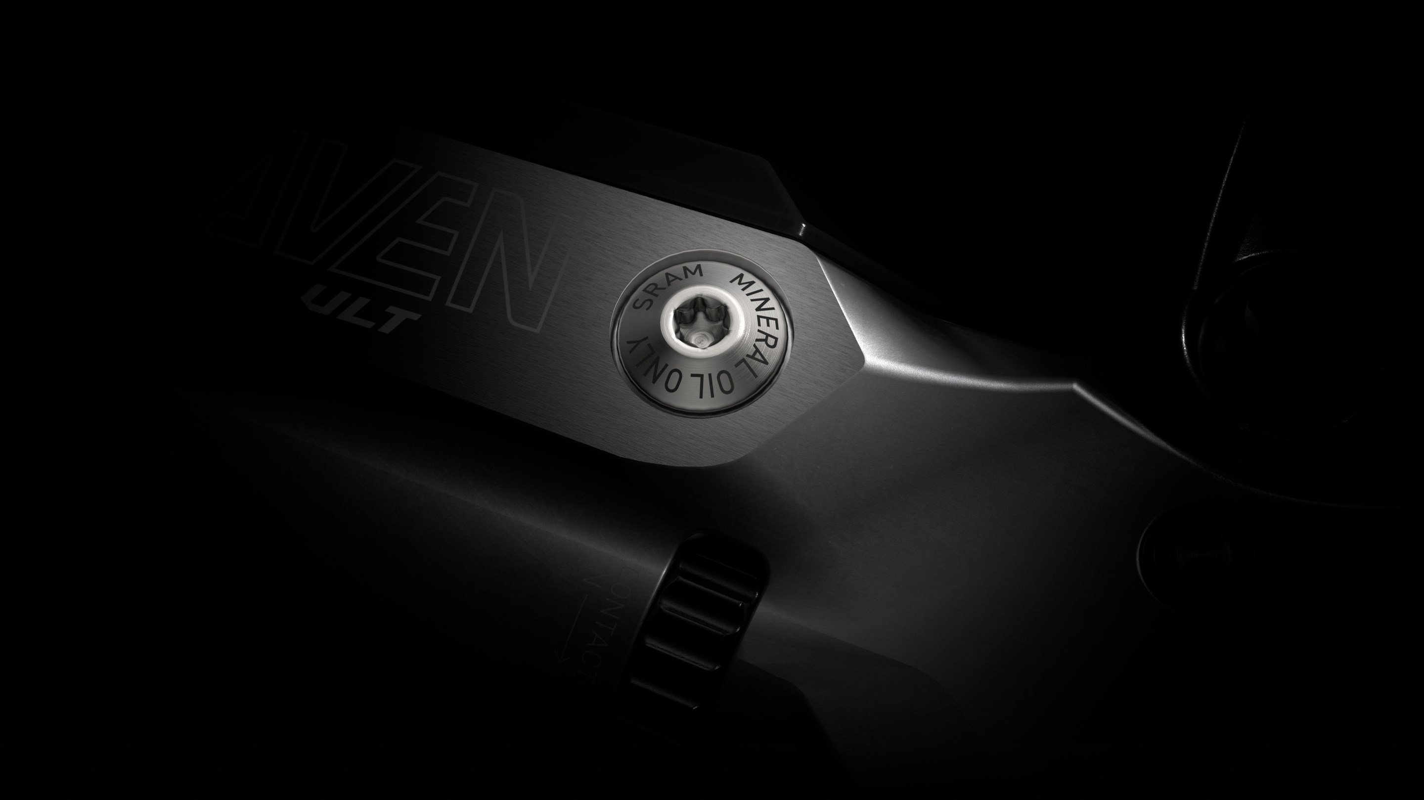 SRAM mineral oil brake bleed port on Maven lever body
