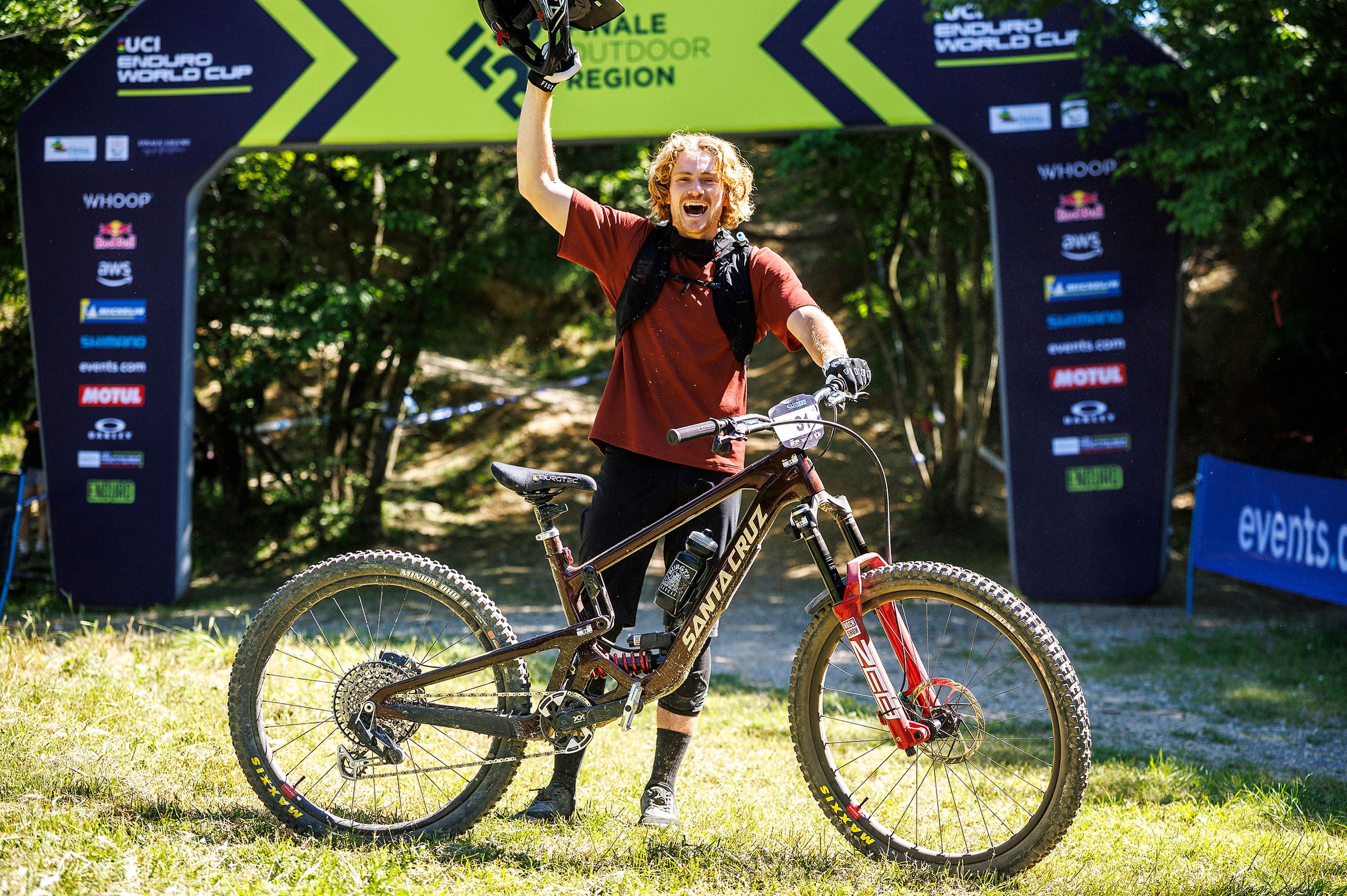 Dan Booker celebrating at finish line