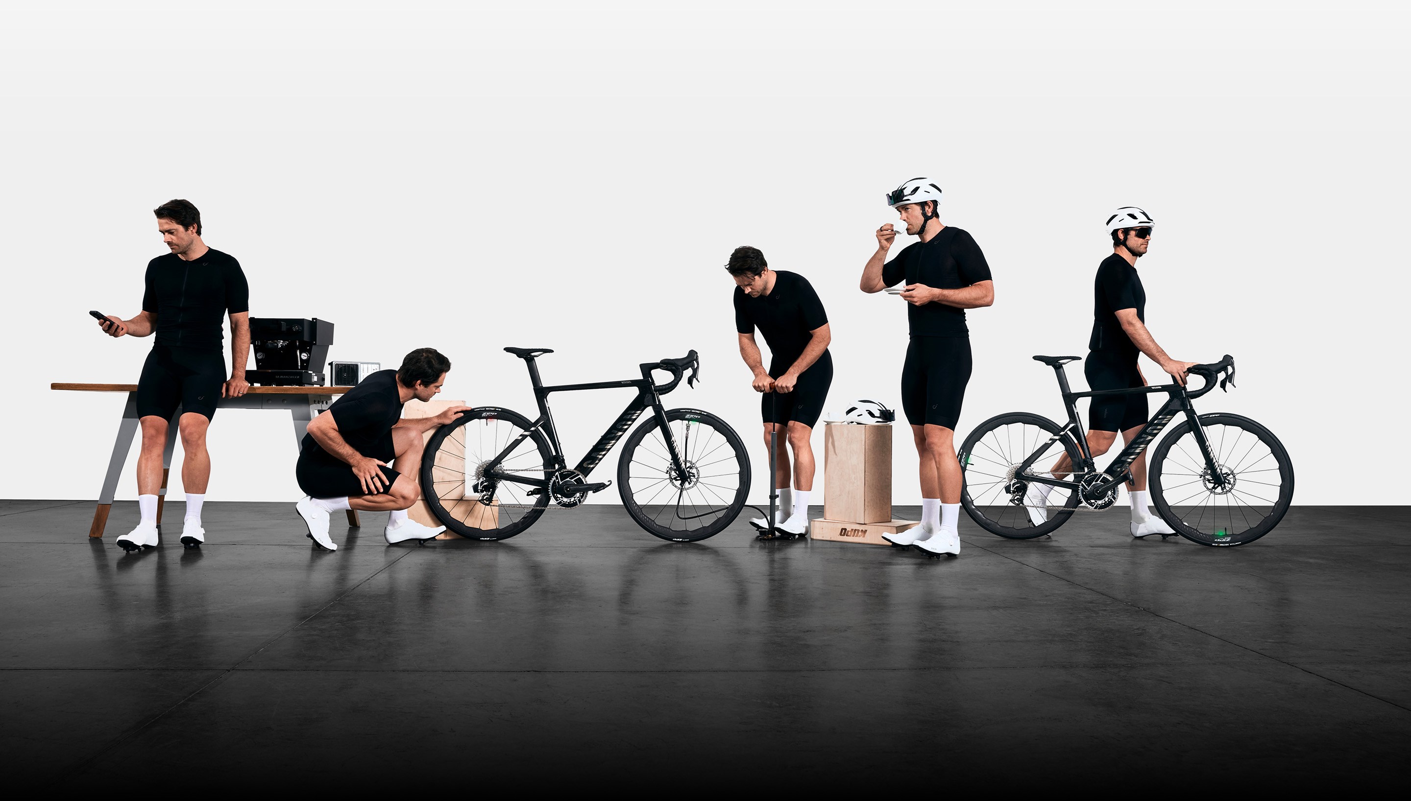 Zipp rider using AXS wheel sensors to quickly check pressure and inflate his Zipp 353 NSW wheelset