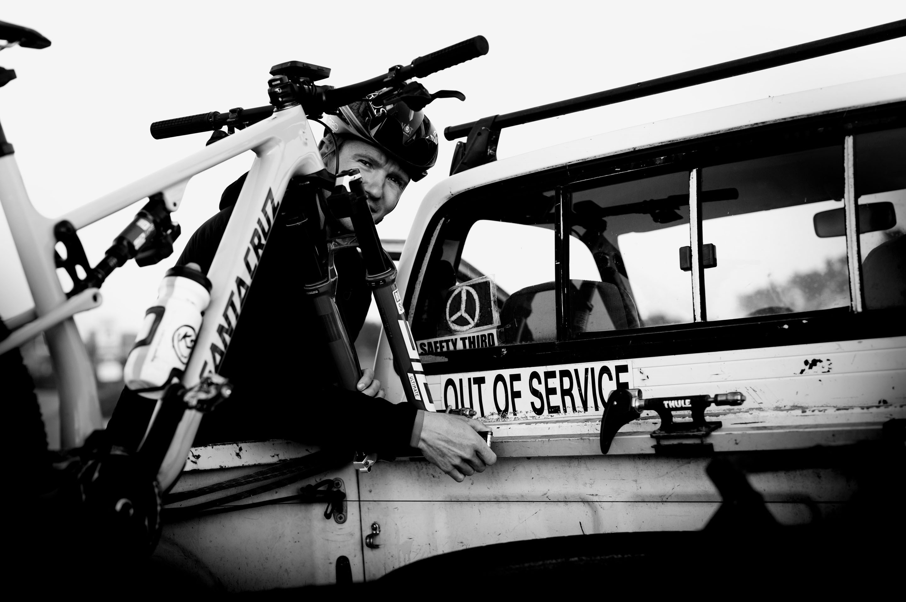Mountain bike in the bed of an old Toyota truck