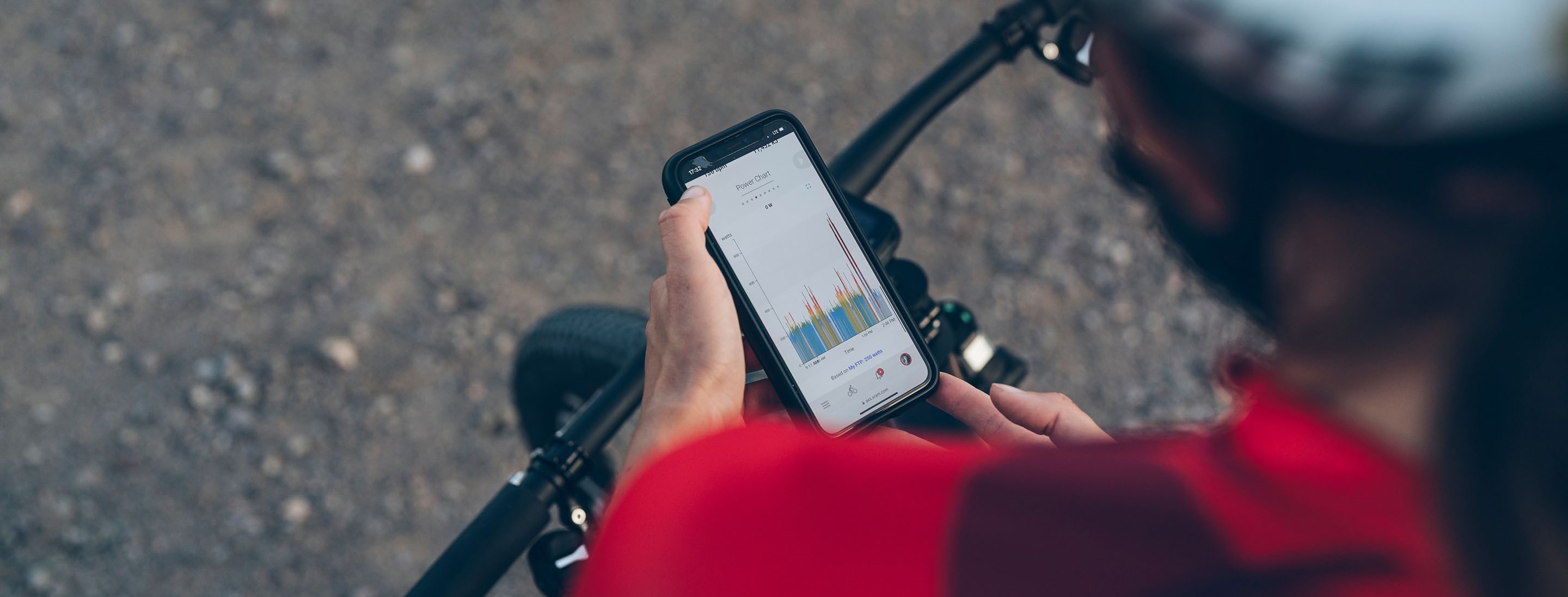 Rider viewing ride data on their phone.