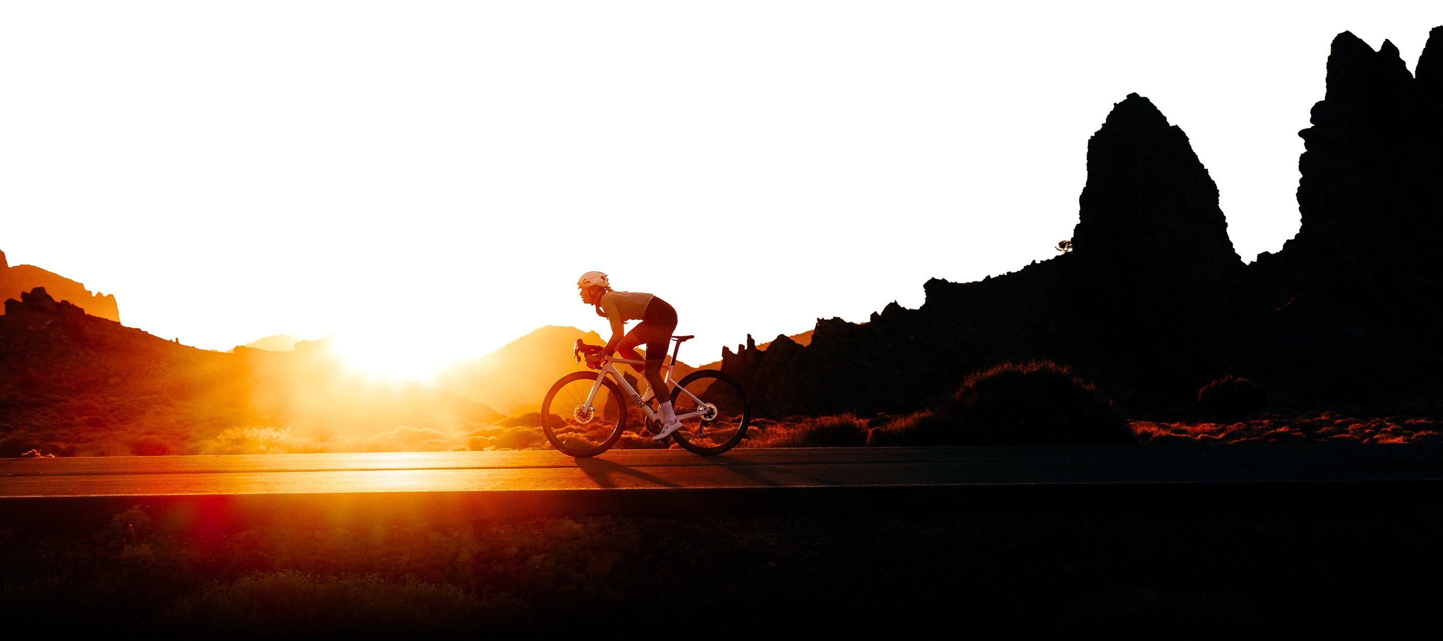Rider on Zipp wheels at sunset