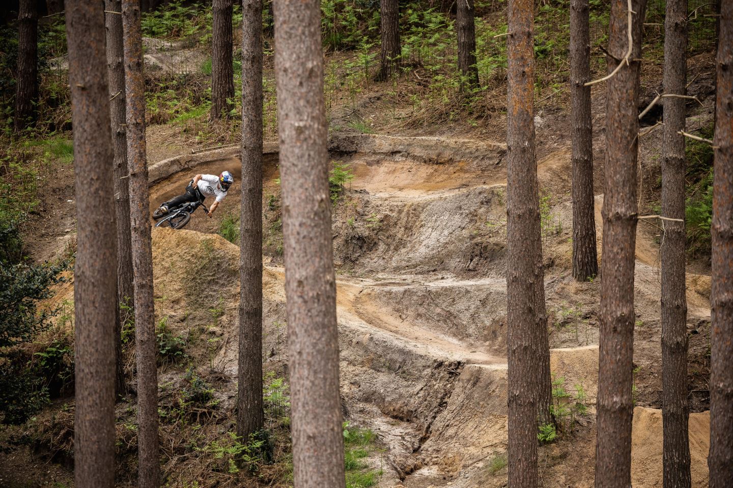 A front-on shot of Kade Edwards riding down a trail.