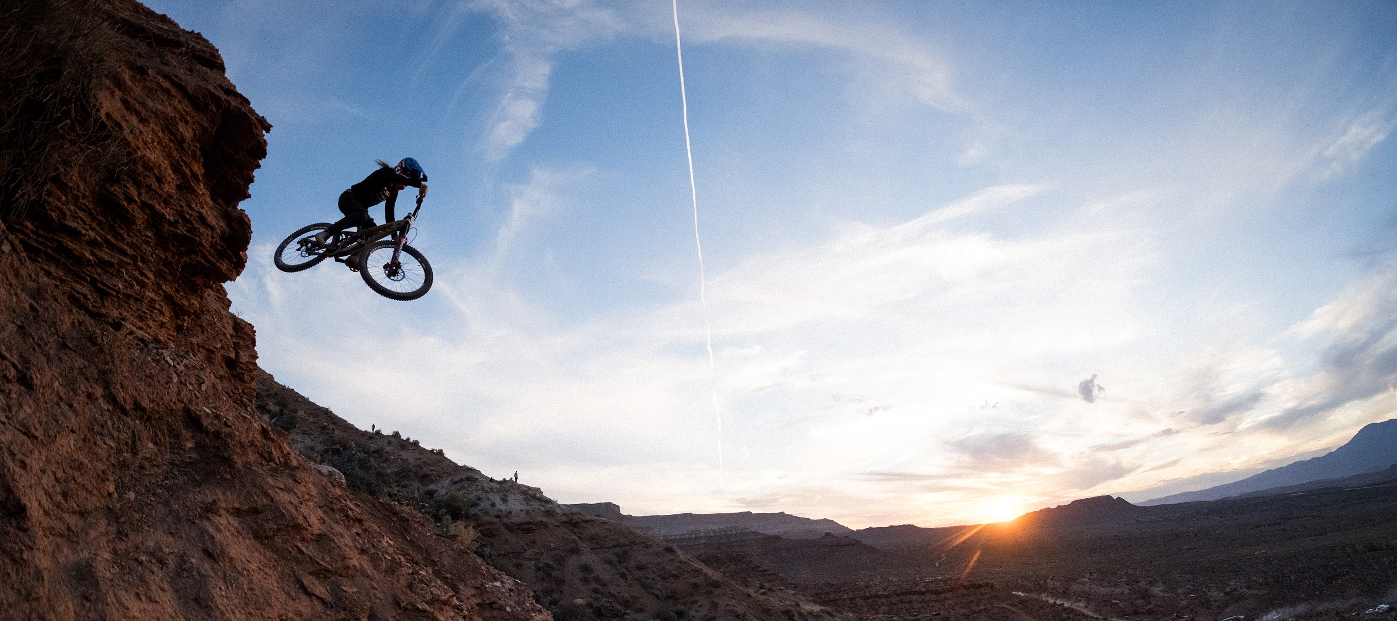 Casey Brown sends it on her practice line as the sun is setting.