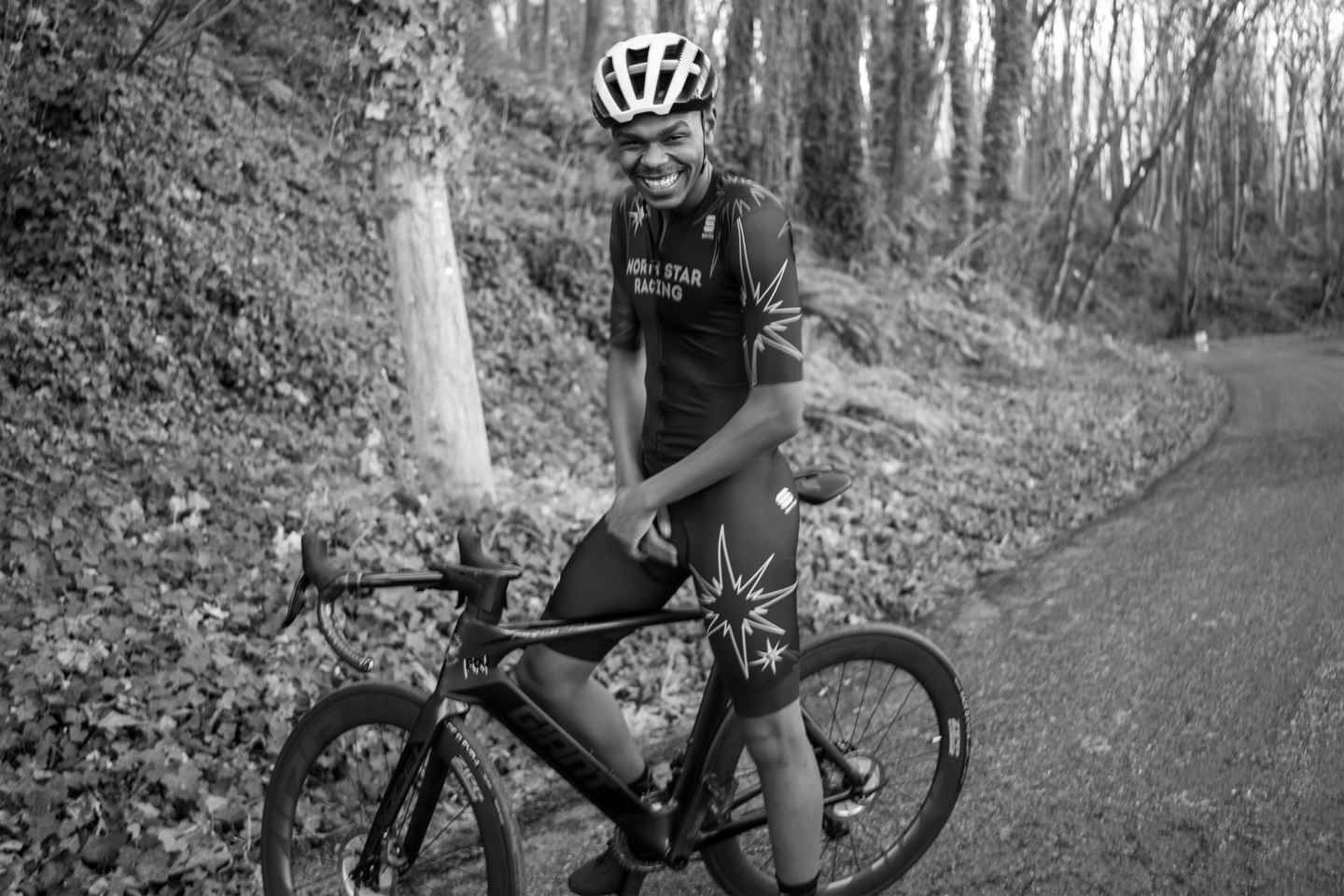 Trevon Mitchell smiling on his bike.