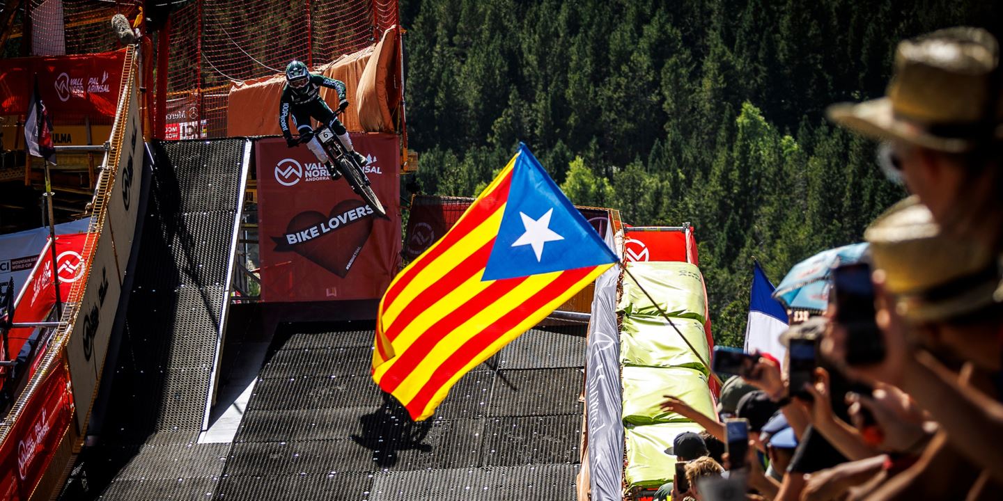 Loris Vergier on the last man-made step down on the World Cup DH track in Vallnord, Andorra.