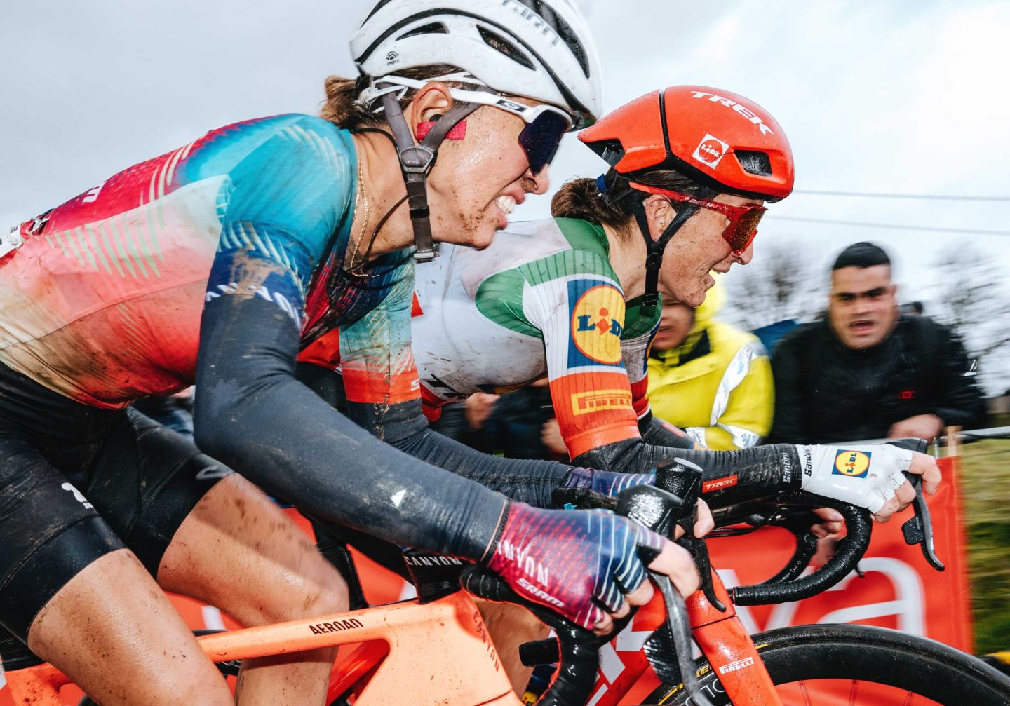 Kasia Niewiadoma and Elisa Longo Borghini race to the finish line at the 2024 Tour of Flanders