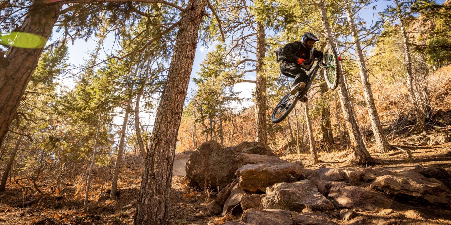 Brad Simms hitting jump on Chutes Trail