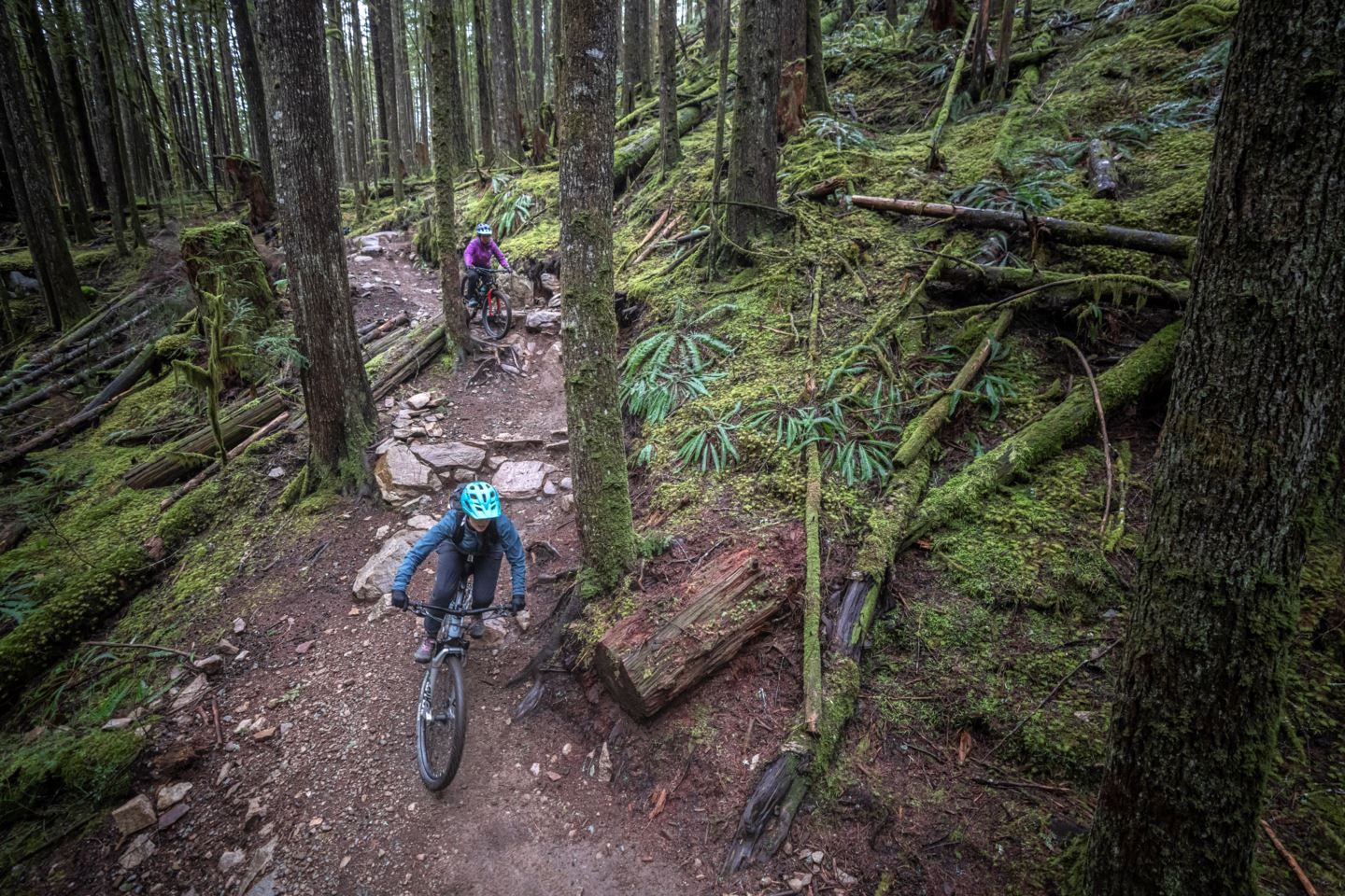 Melissa and Michele riding singletrack