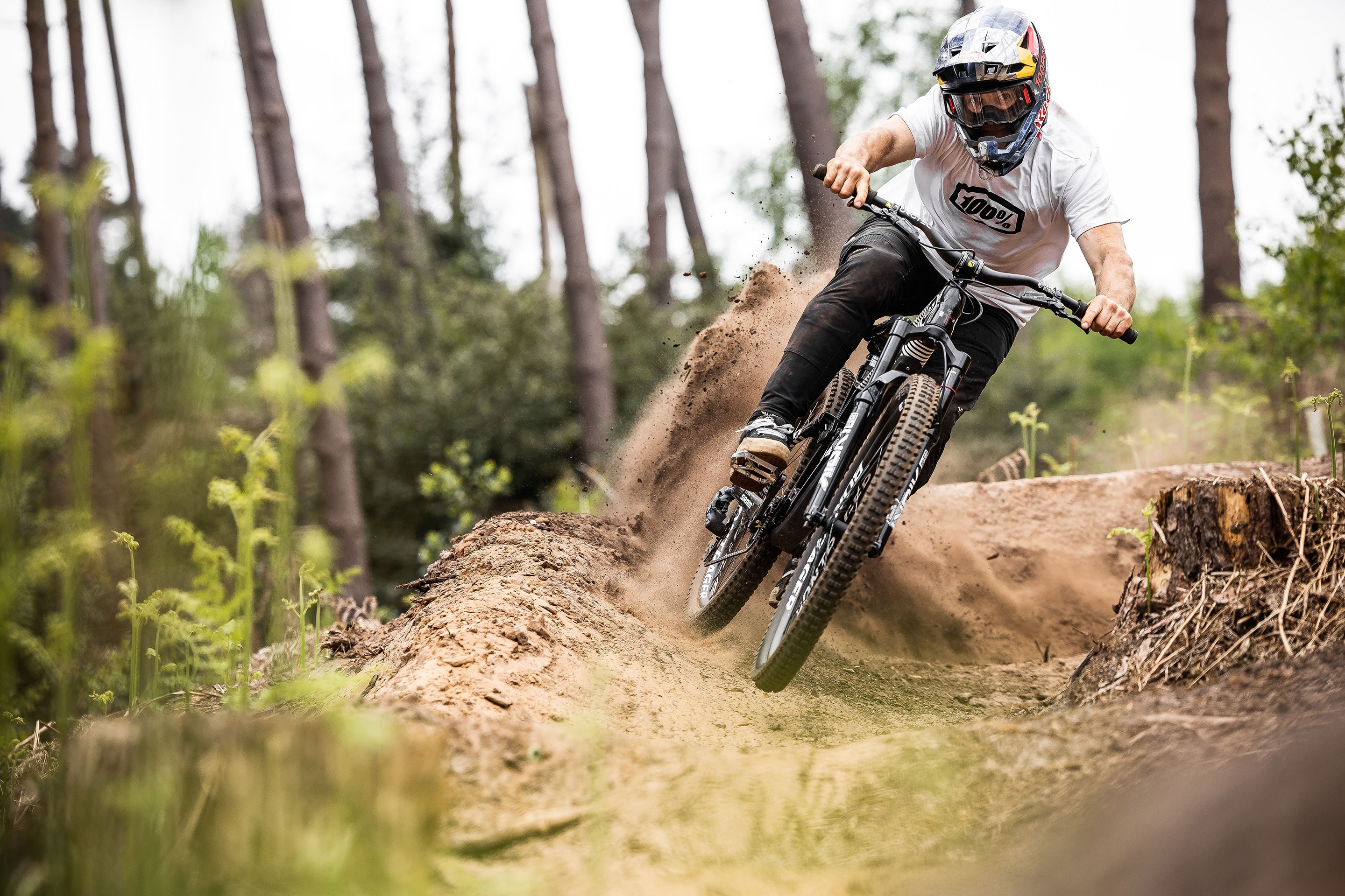 Kade Edwards throwing dirt at the camera.