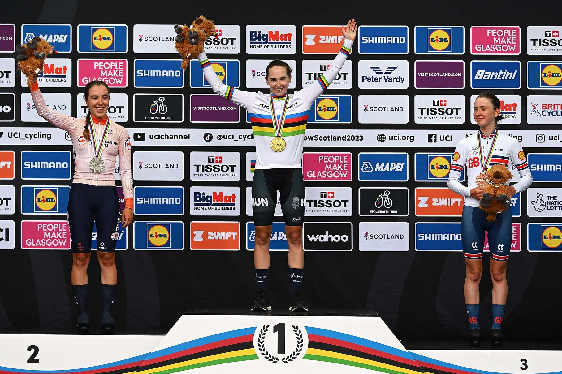 Blanka Vas salutes in the rainbow jersey