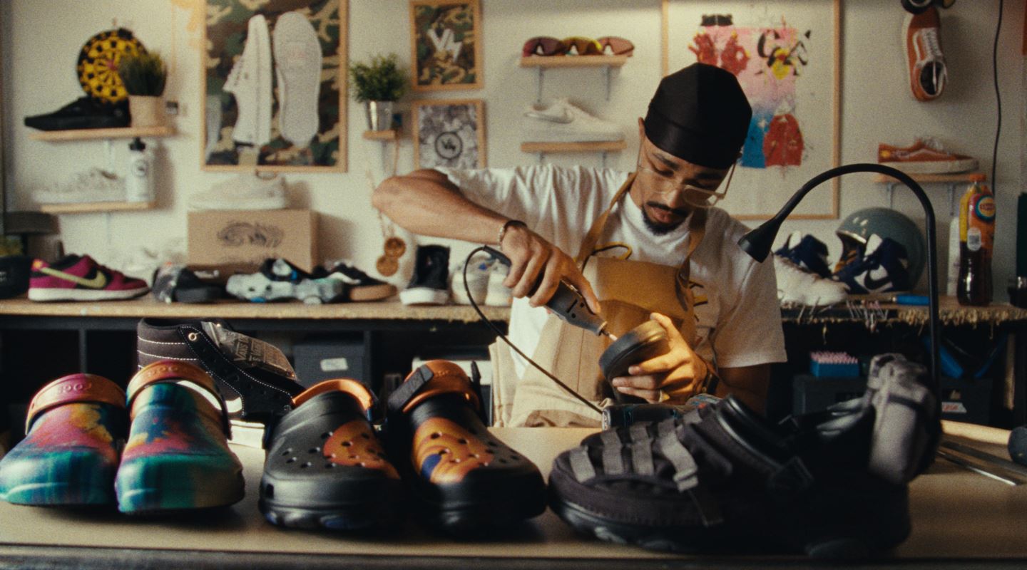 Alex Valcko working on a custom Vans sneaker in his studio.