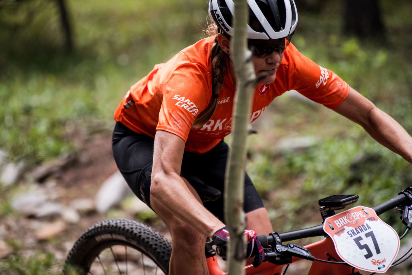 Alexis Skarda passes at tree at the 2021 Breck Epic