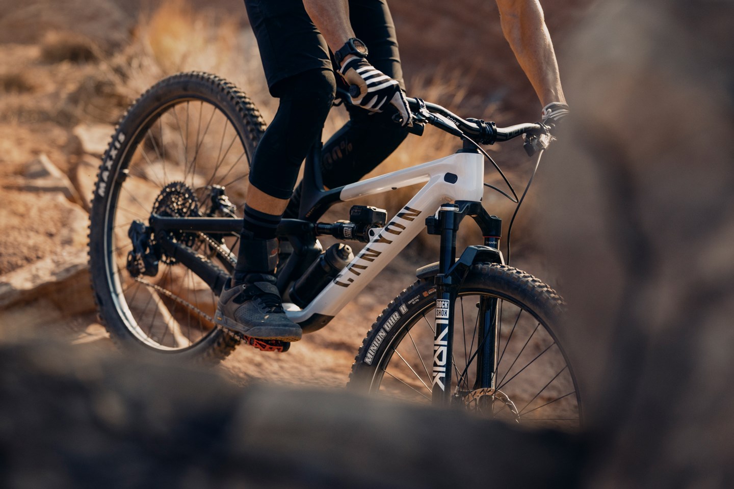 Zoomed in on Braydon Bringhurst riding Flight Attendant-equipped Canyon Spectral.