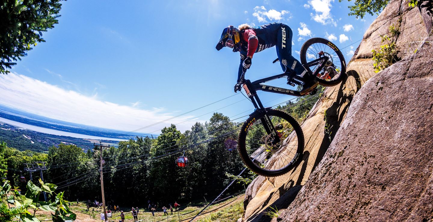 Vali Holl riding down a rockface.