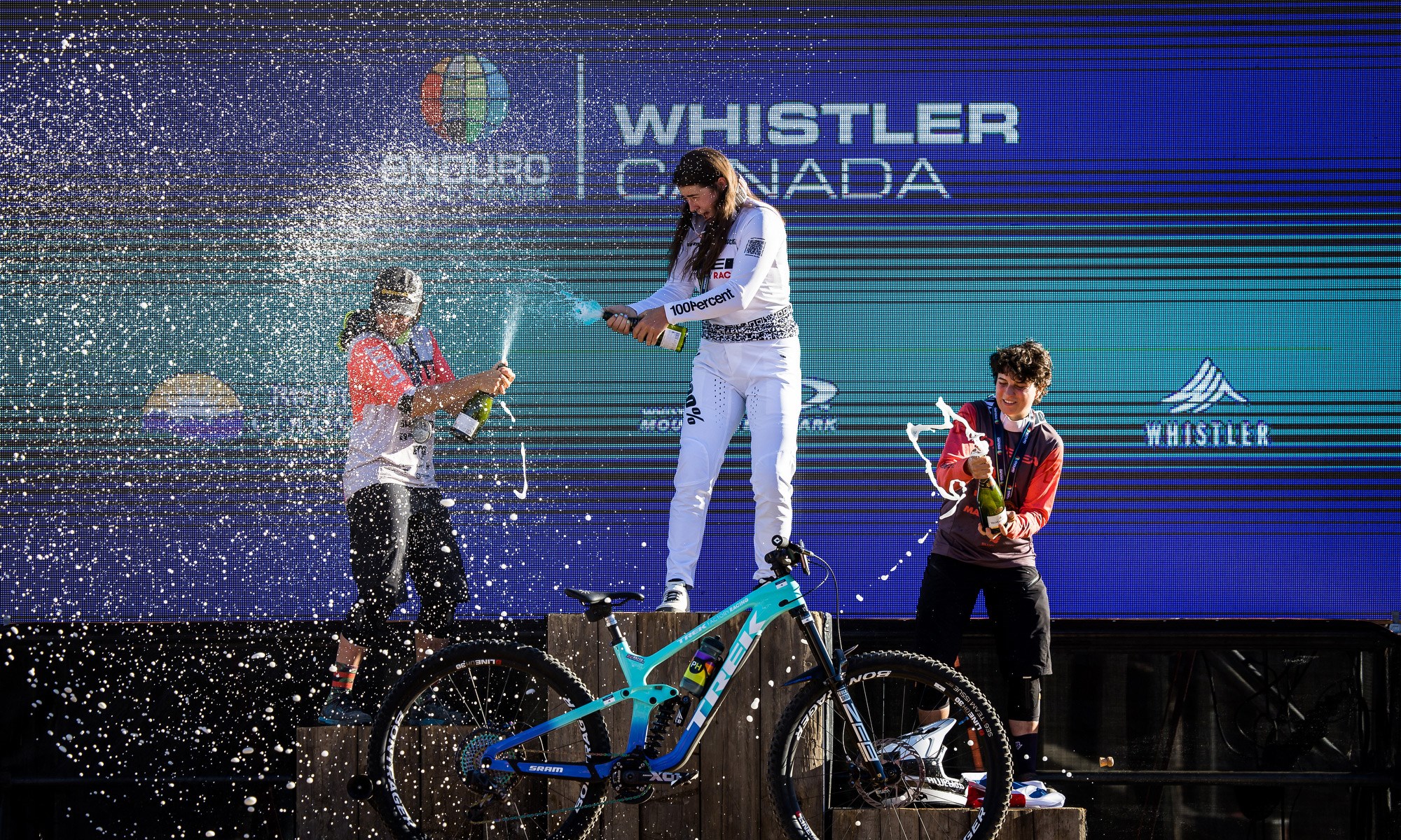 hattie sprays champagne.