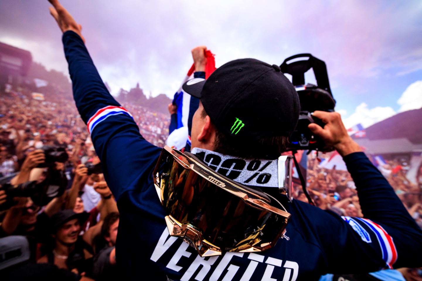 The wildly passionate French fanfare in front of Loris Vergier and the rest of the Elite Men's DH podium.