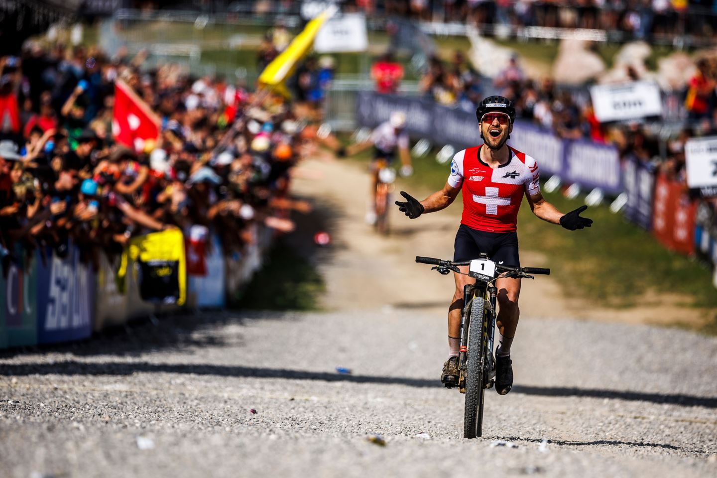 Nino Schurter crosses the line for his tenth World Championship title in Elite XCO.