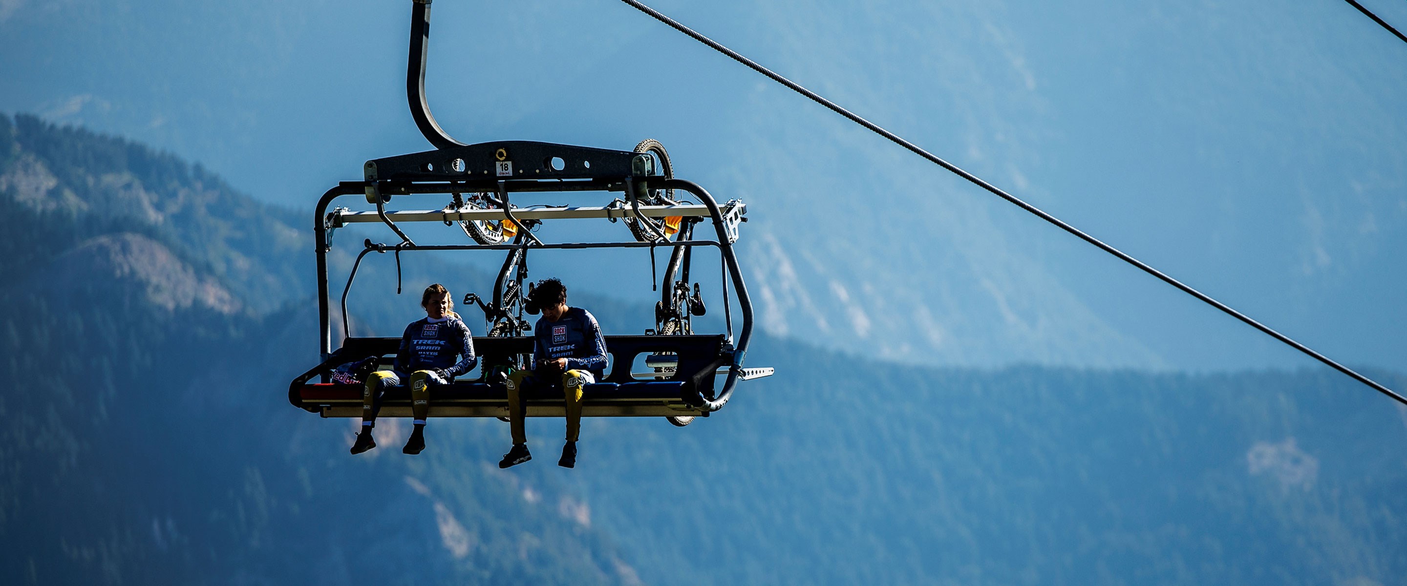 Tegan Cruz + Vali Höll on chair lift