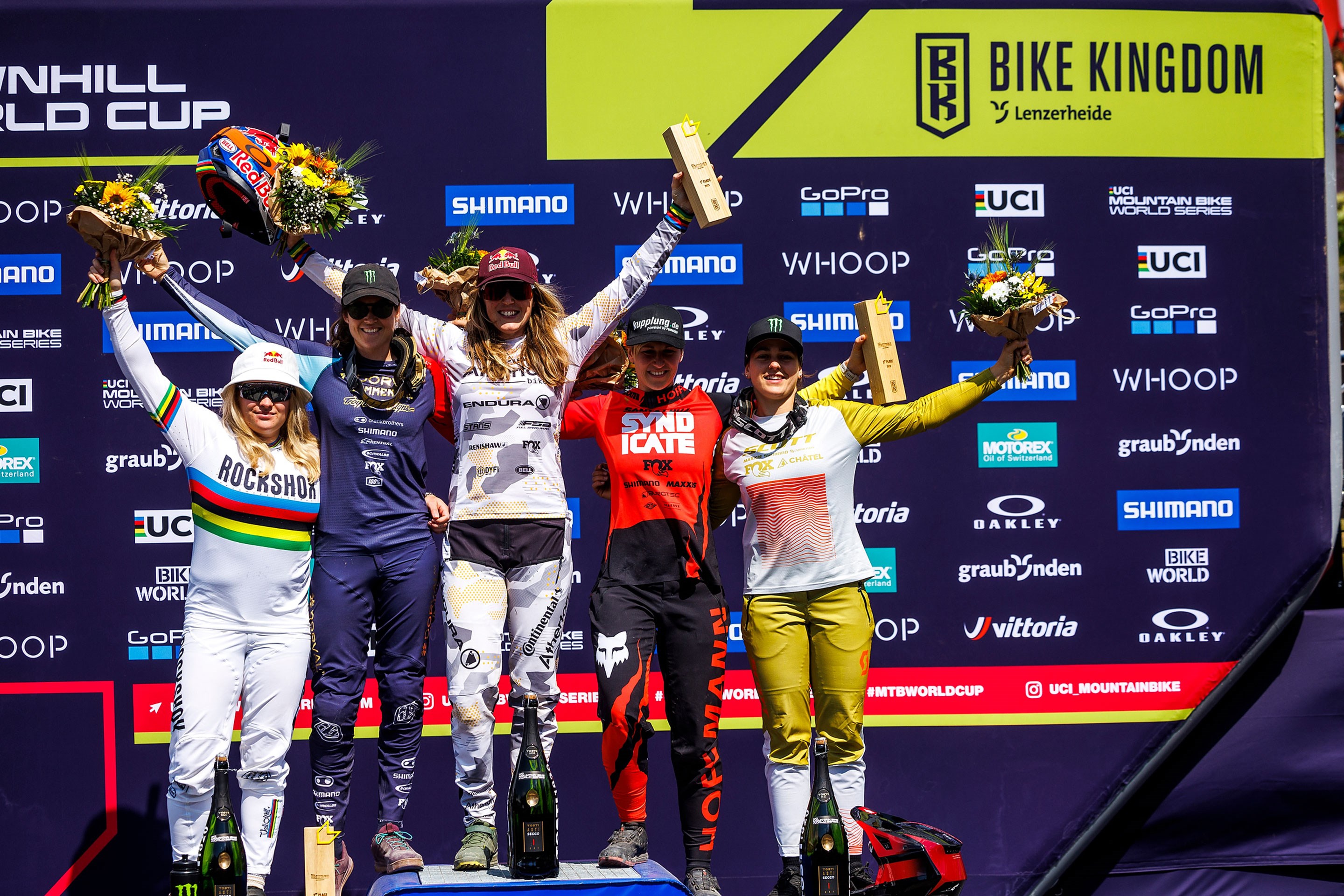 Elite Women's podium in Lenzerheide, Switzerland. (Standing Left to Right) Vali Höll, Camille Balanche, Rachter Atheron, Nina Hoffman, Marine Cabirou.