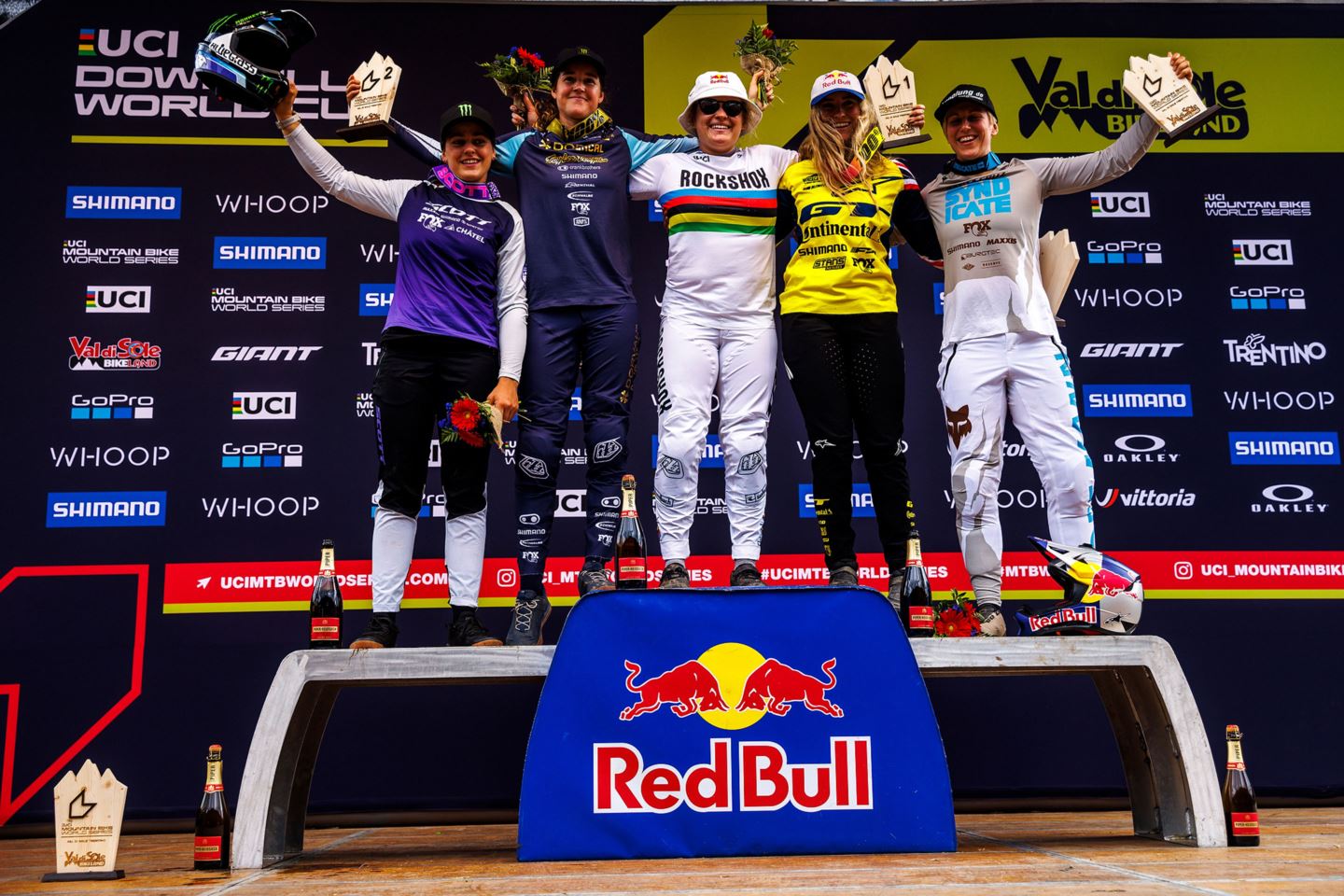 Elite Women's podium in Val di Sole, Italy. (Standing Left to Right) Marine Cabirou, Camille Balanche, Vali Höll, Jess Blewitt, Nina Hoffman.